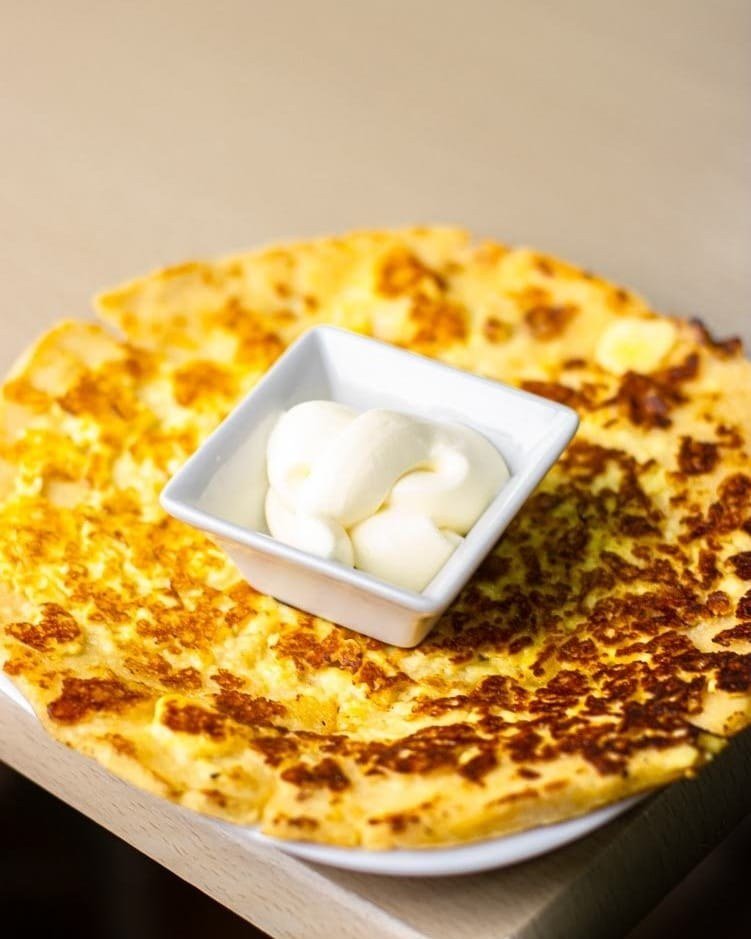 Q' tortilla de 4 quesos con natilla